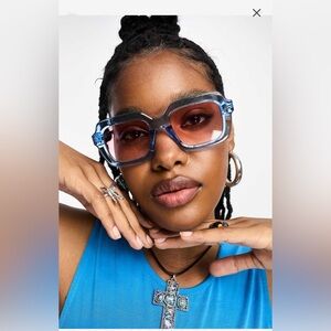 ASOS Design chunky blue sunglasses with pink lenses